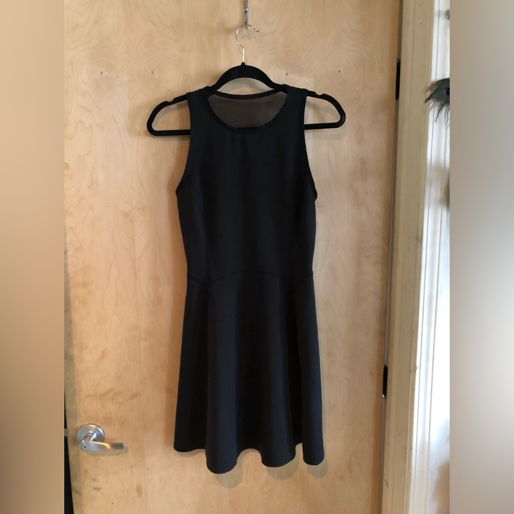 Lululemon Skater Dress with high neck, open back, and mesh detailing. Size #4